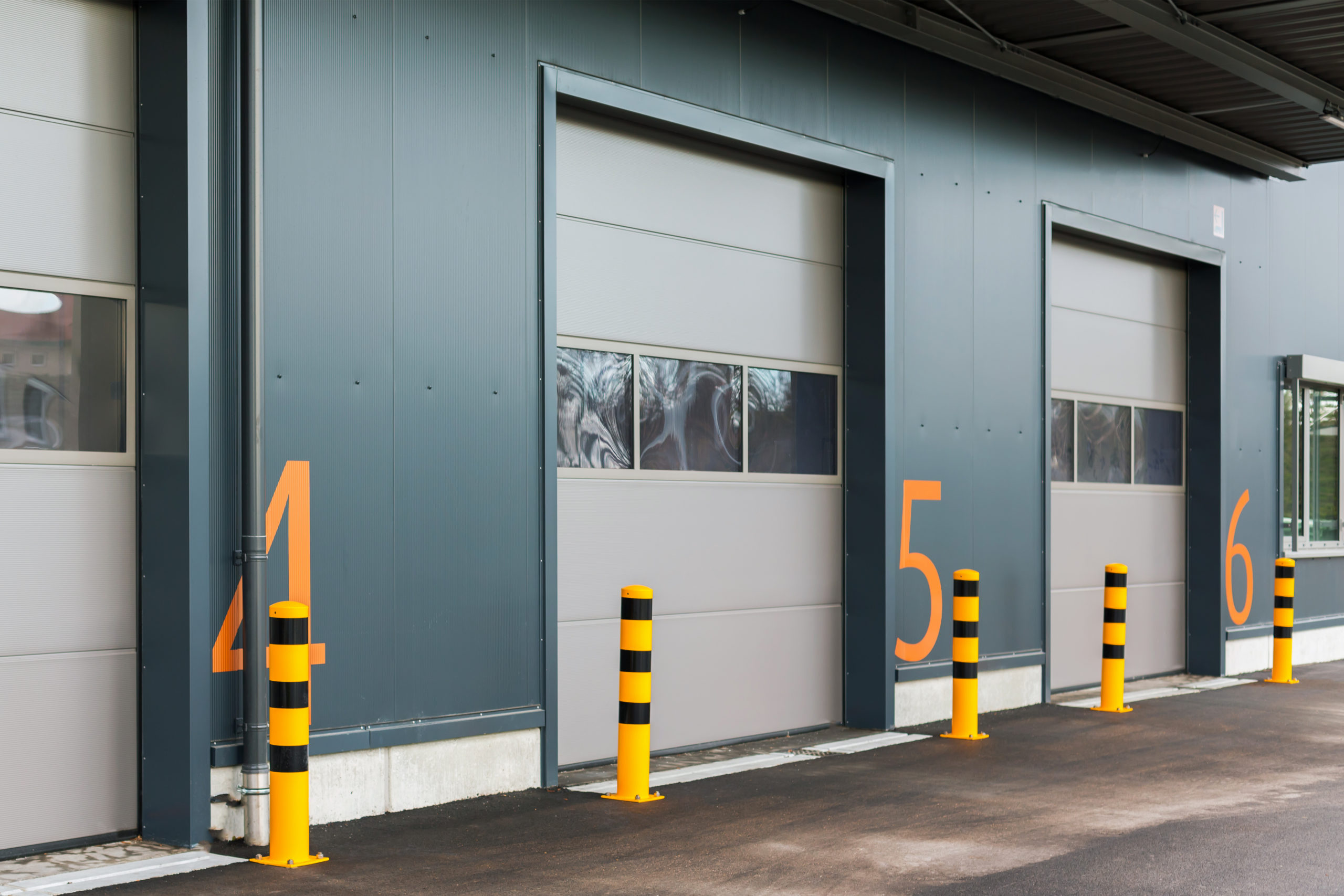 Warehouse gates with numbers. Logistic, storage, shipment, transportation and loading concept