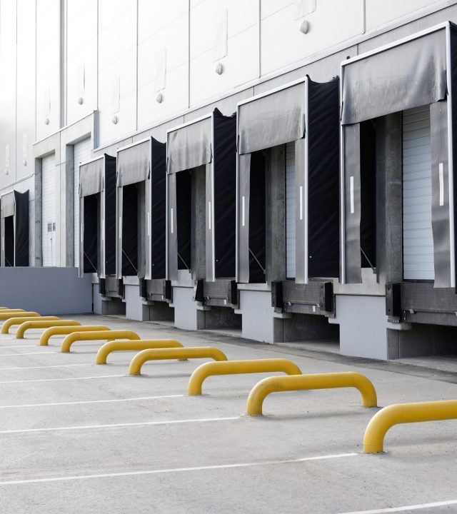 Big distribution warehouse with gates for loading goods